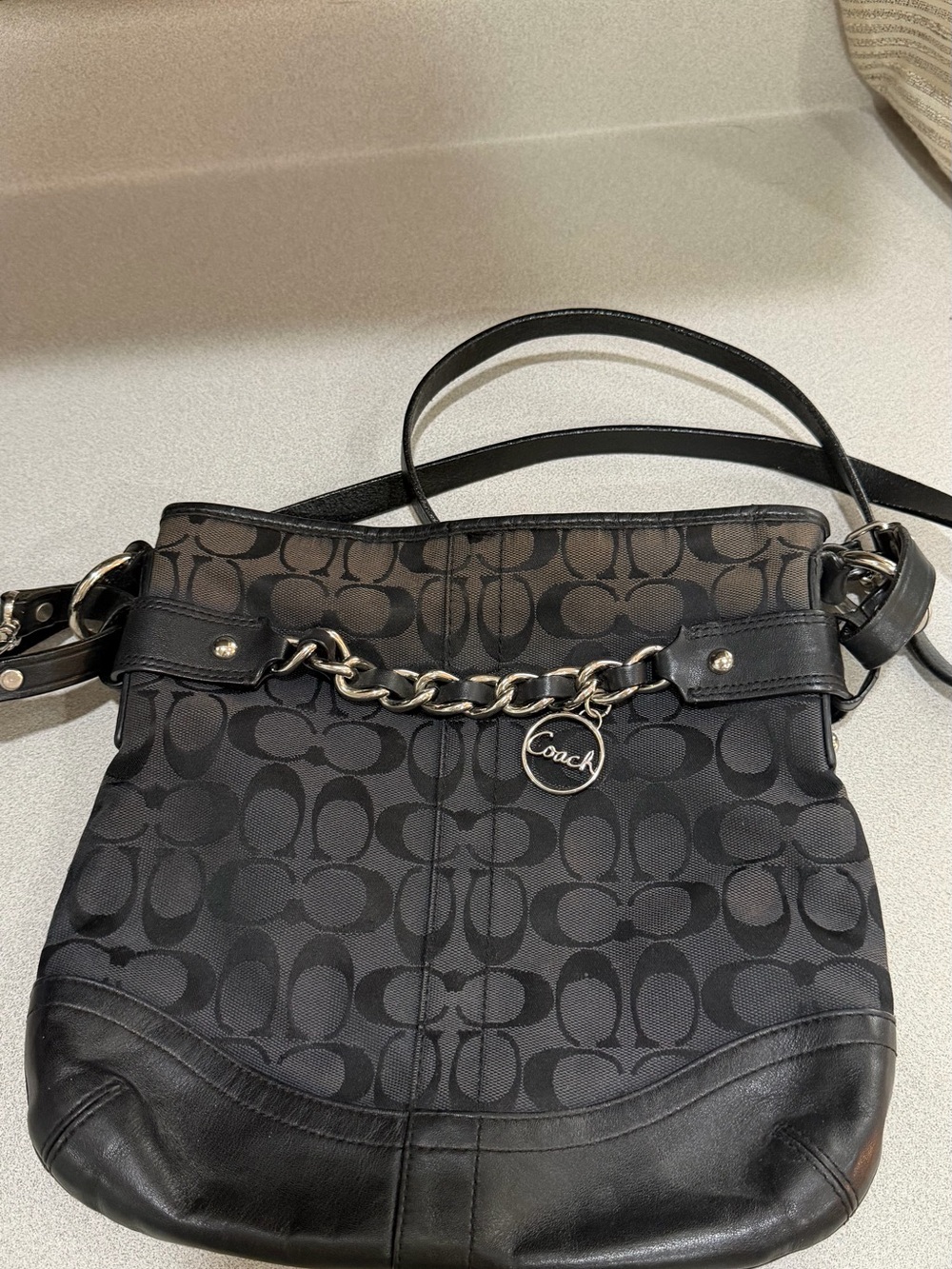 Coach shoulder bag slight fading at top of bag reflects price